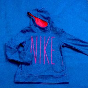 Nike girl in pink hoodie